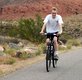 View - Curtis rides a bike on our vacation in St. George, Utah